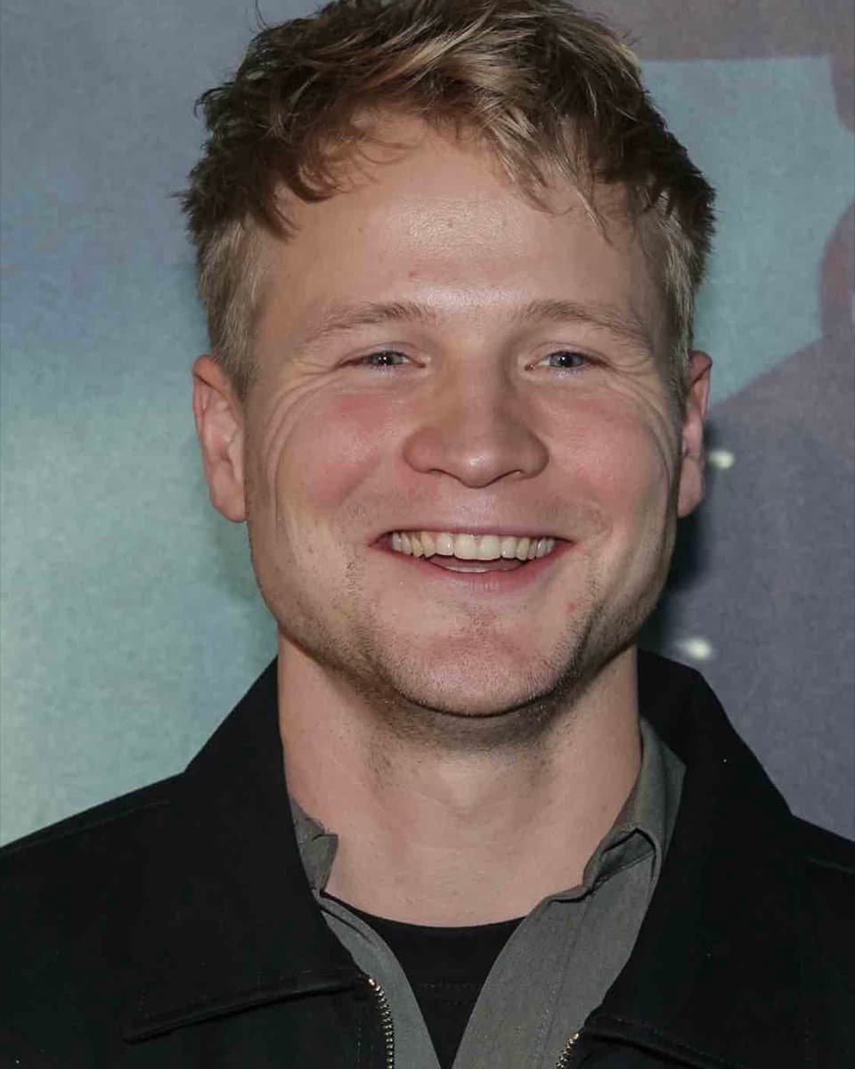 Kalvijn, lachend op een filmpremière